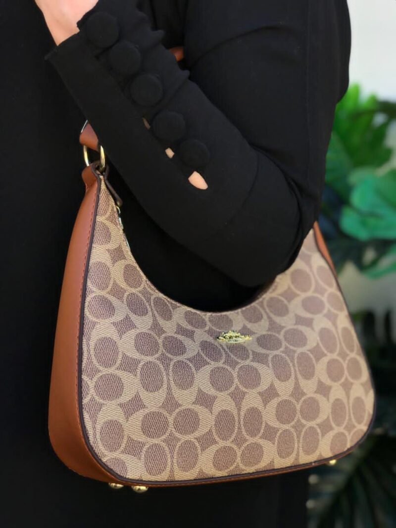 شنطة كوتش جلد بني