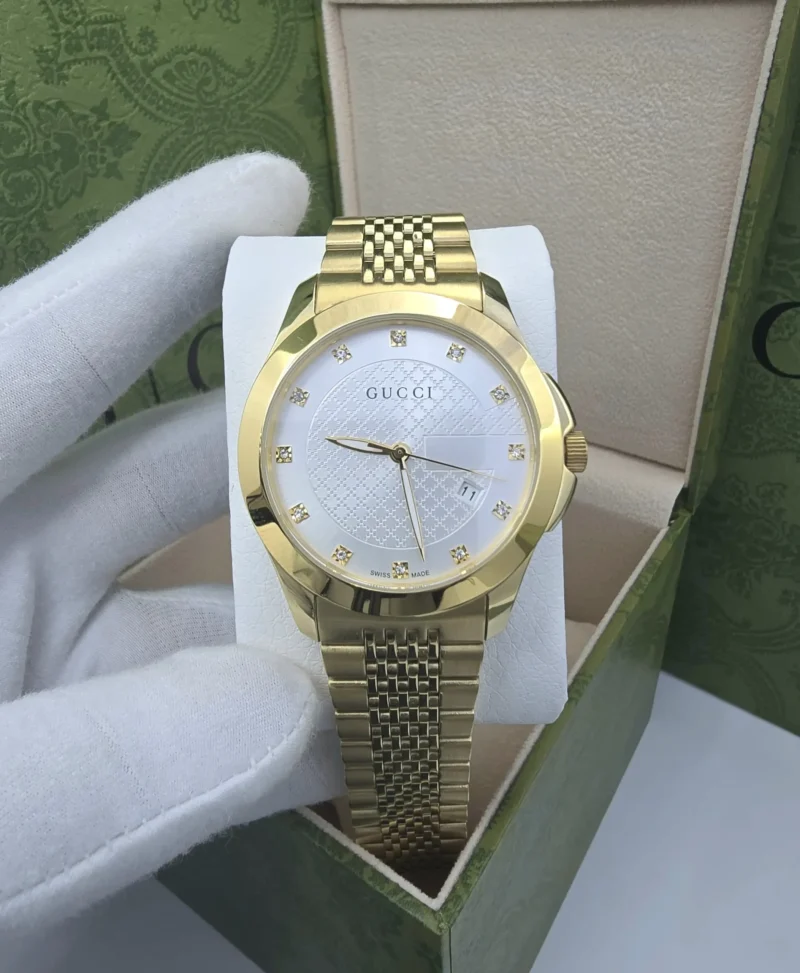 ساعه قوتشي رجاليه ذهبيه