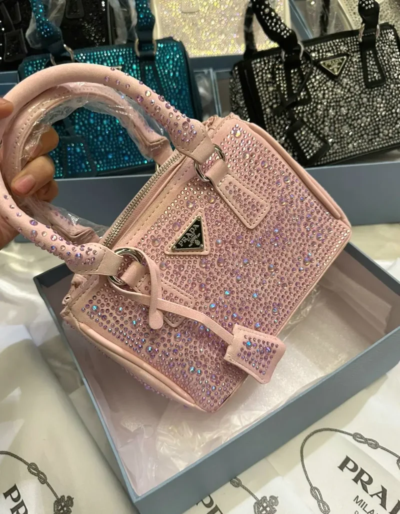 شنطة كريستال وردي