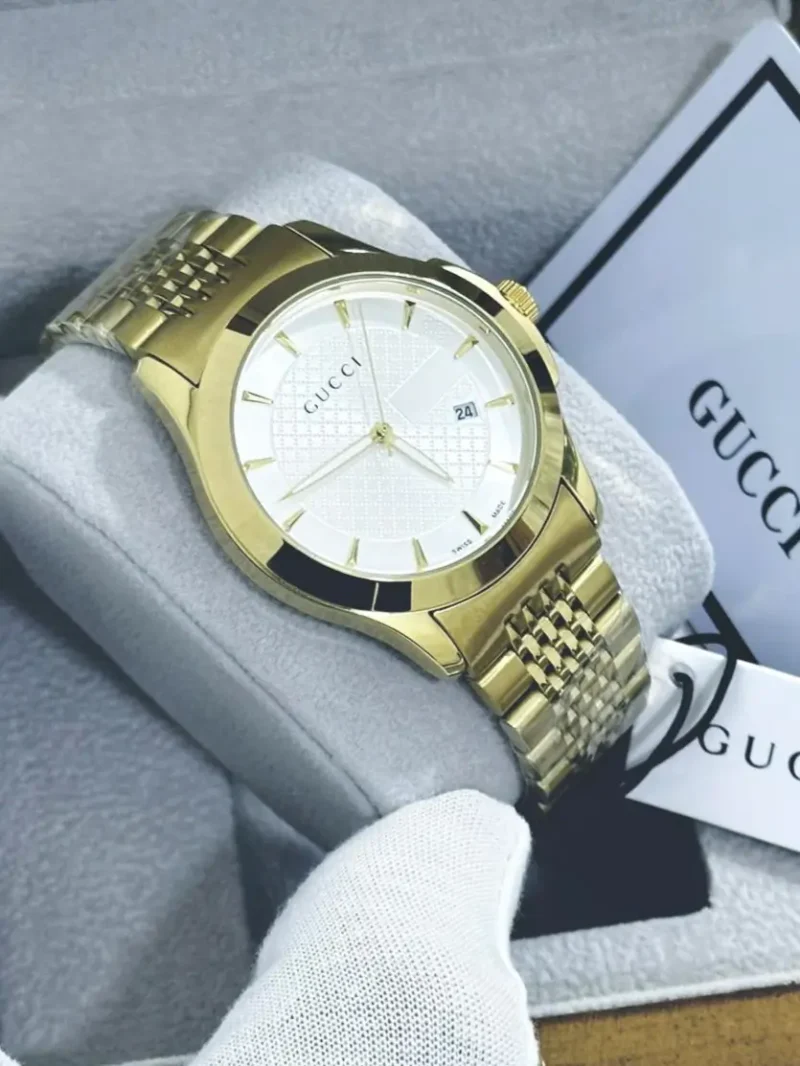 ساعه رجالي ذهبي ماركه قوتشي