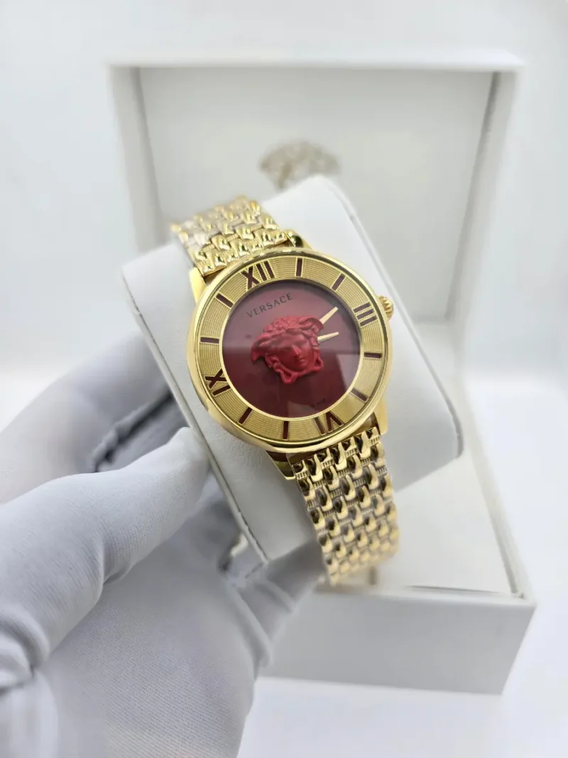 ساعه فرزاتشي نسائي ذهبي مينا احمر