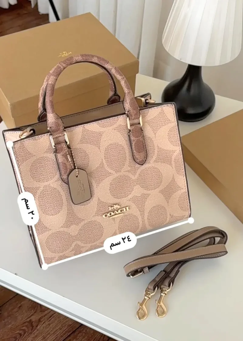 شنطة كوتش وردي وسط