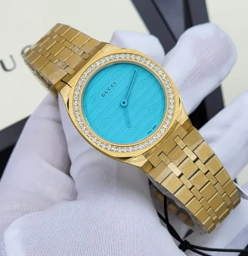 ساعة قوتشي نسائي ذهبيه