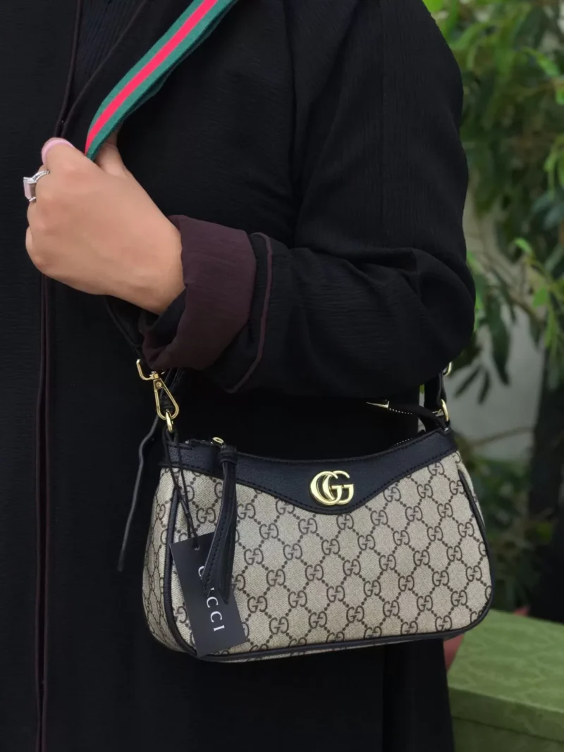 شنطه قوتشي السوداء