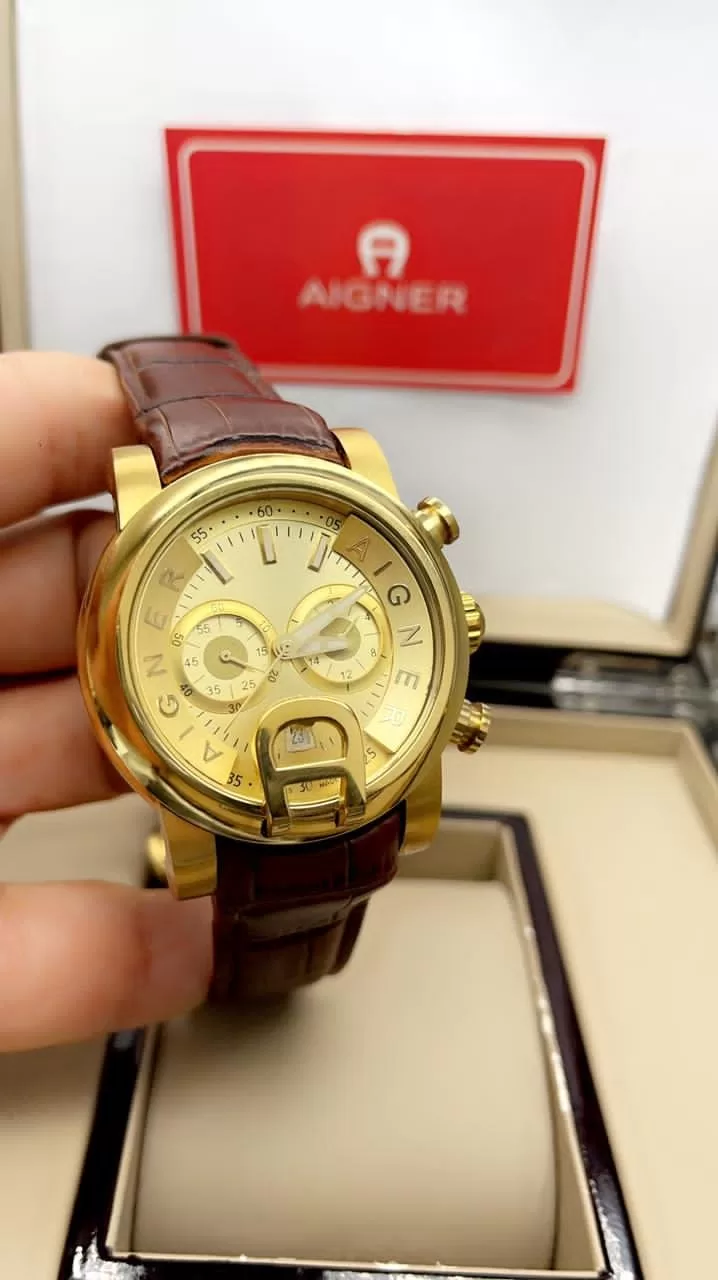 ساعة رجالية اقنر جلد بني