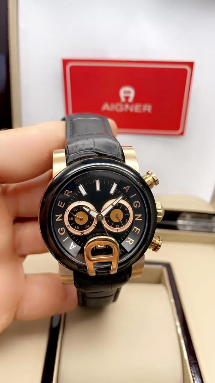 ساعه اقنر رجاليه جلد اسود