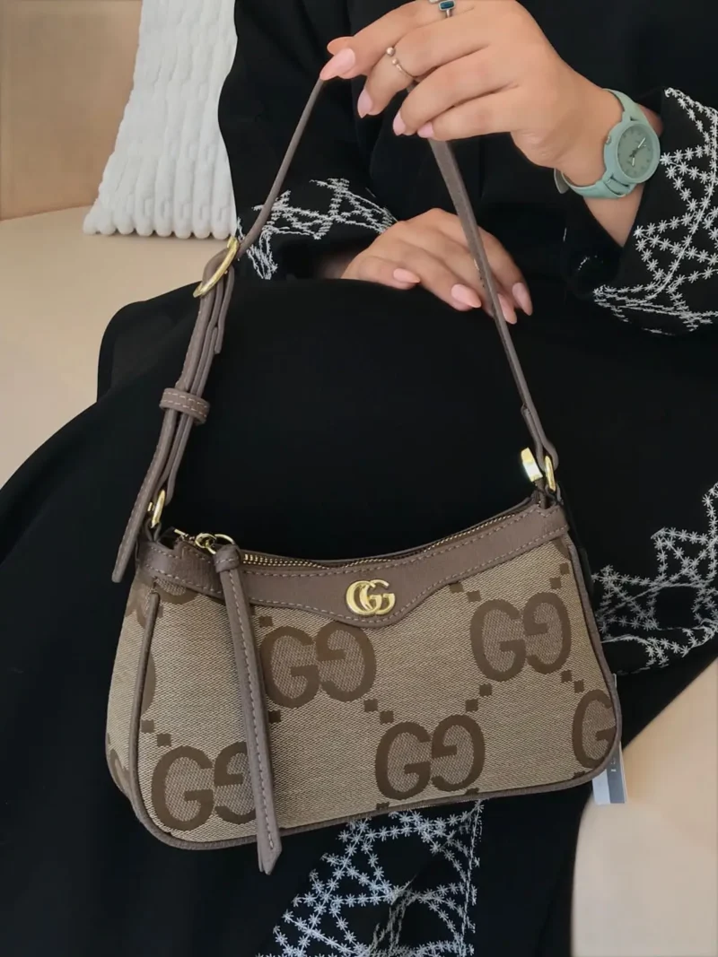 شنطة قوتشي بني