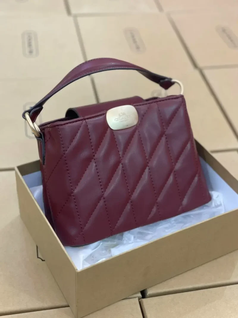 ماركة كوتش شنط COACH كتف إليزا مصنوعة من الجلد، لون اسود