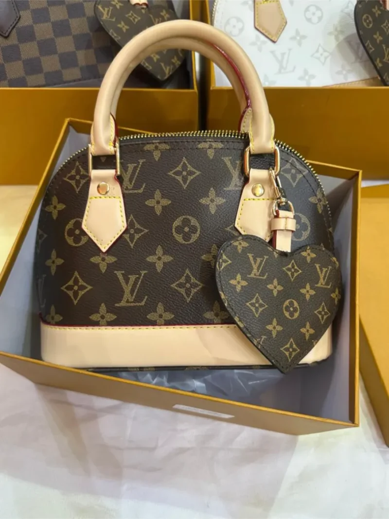 شنط لويس فيتون بنيه