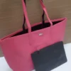 شنطة وردي كبيرة ماركة