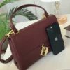 شنطة سي اتش عنابي