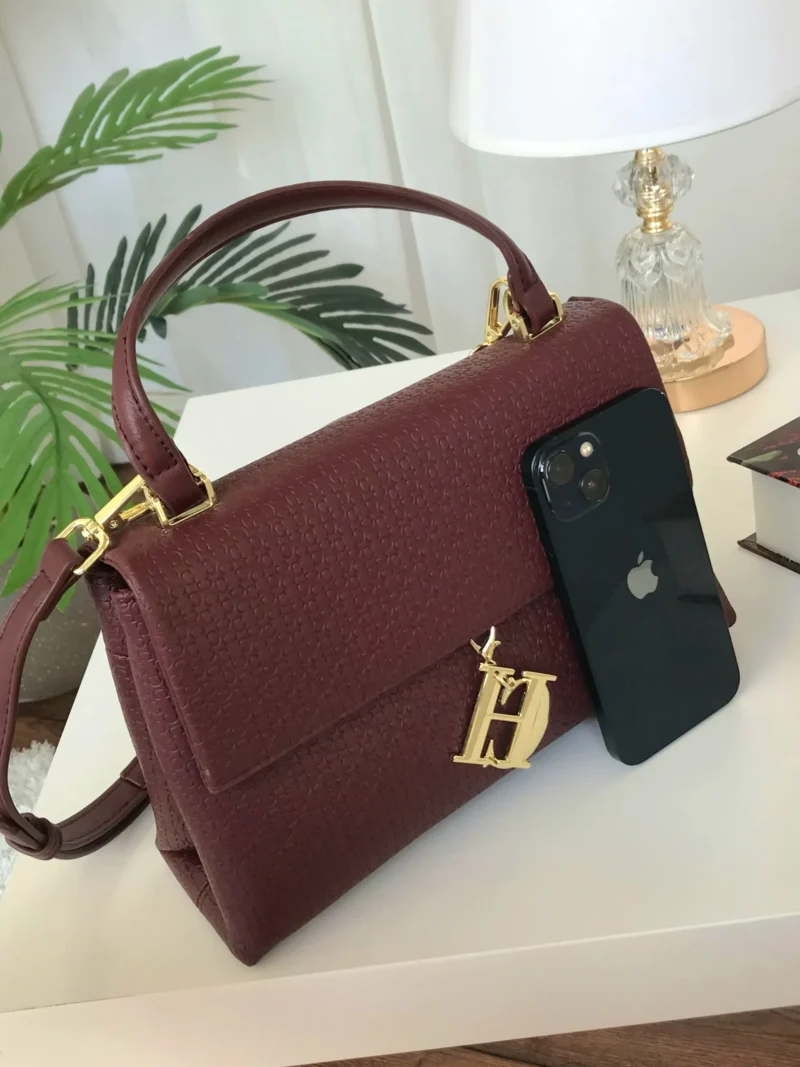 شنطة سي اتش عنابي