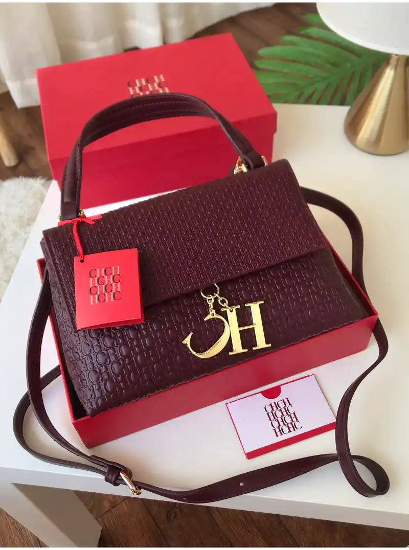 شنطة سي اتش عنابيه