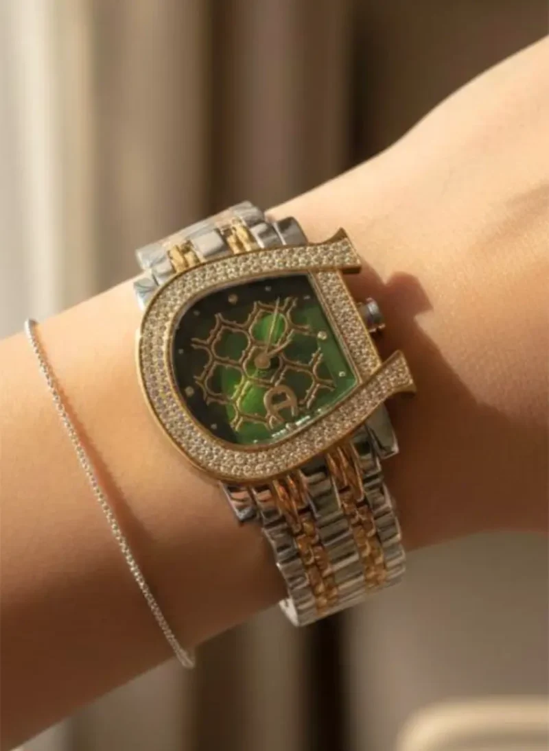 ساعه اجنر نسائي زيتي