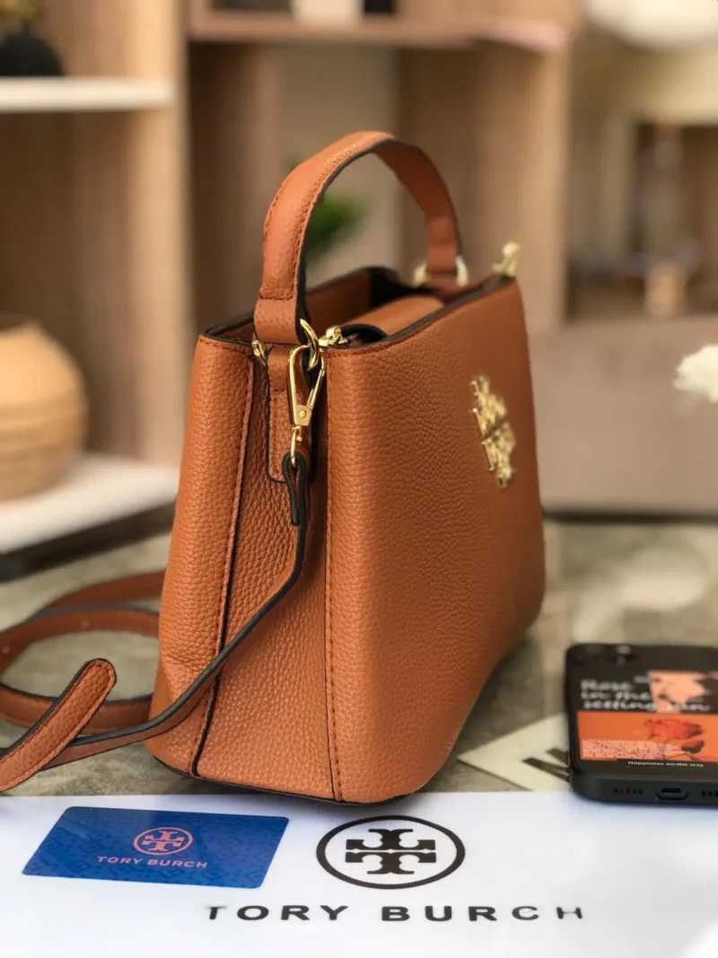 شنطه برتقاليه ماركة توري بورش