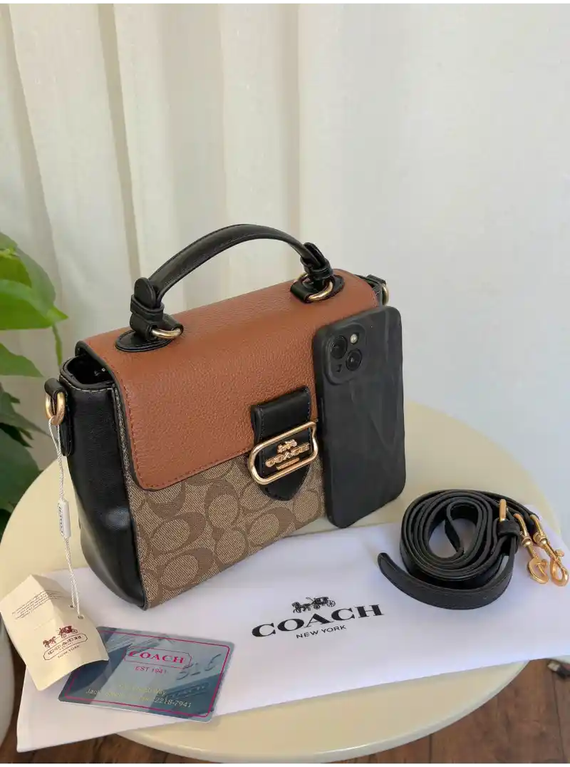 شنطه كوتش لون بني