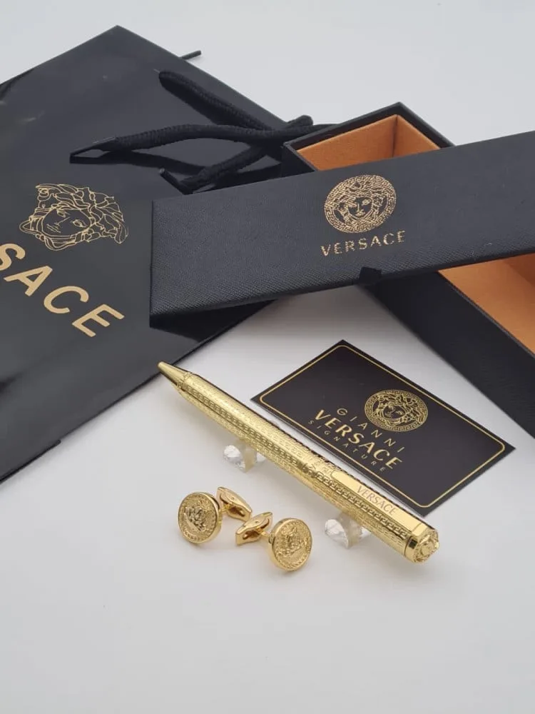 طقم ذهبي قلم وكبك