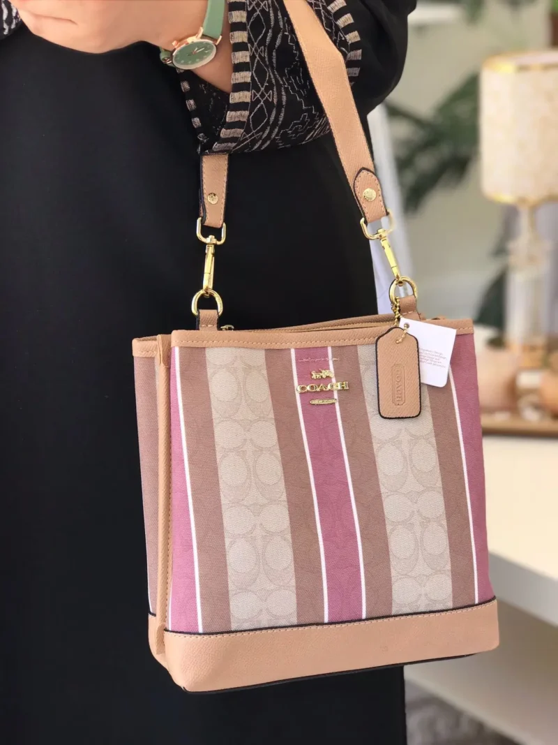 شنطة كوتش وردي