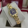 ساعة اقنر نسائي ذهبي مينا اسود