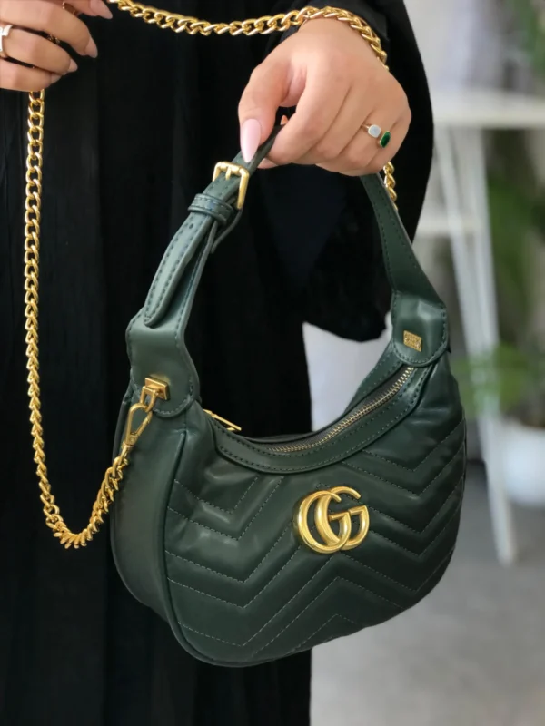 شنطة قوتشي خضراء