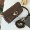 شنطة كوتش بني الهبه