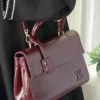 شنطه لويس فيتون العنابيه