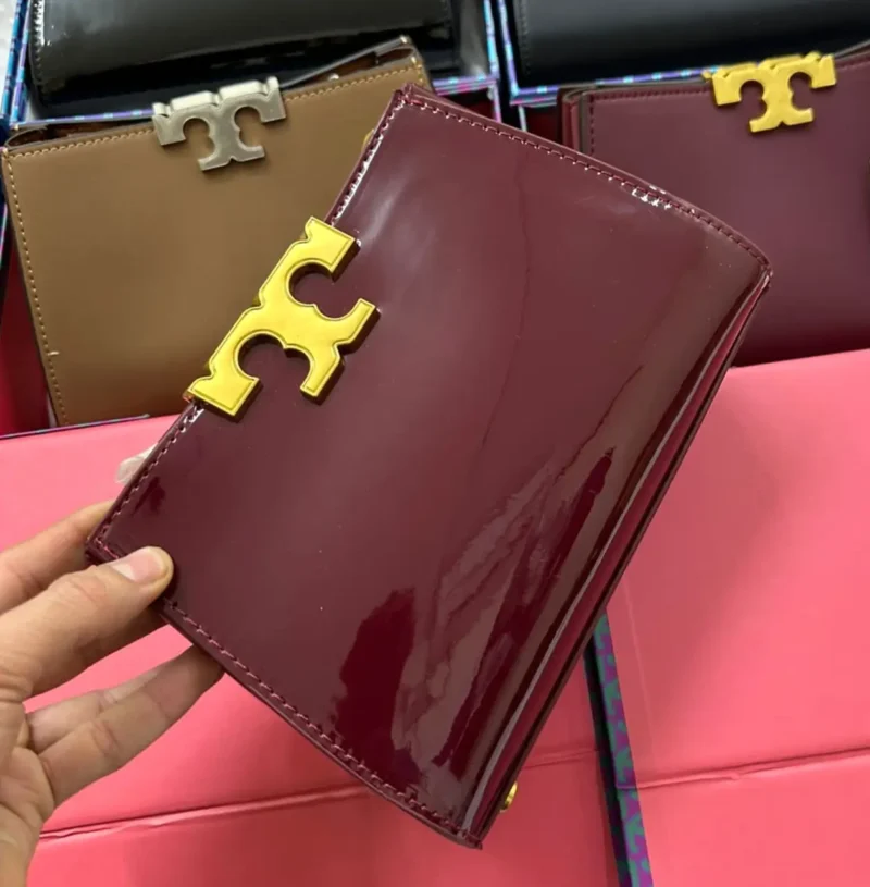 شنطه جلد عنابي لامع