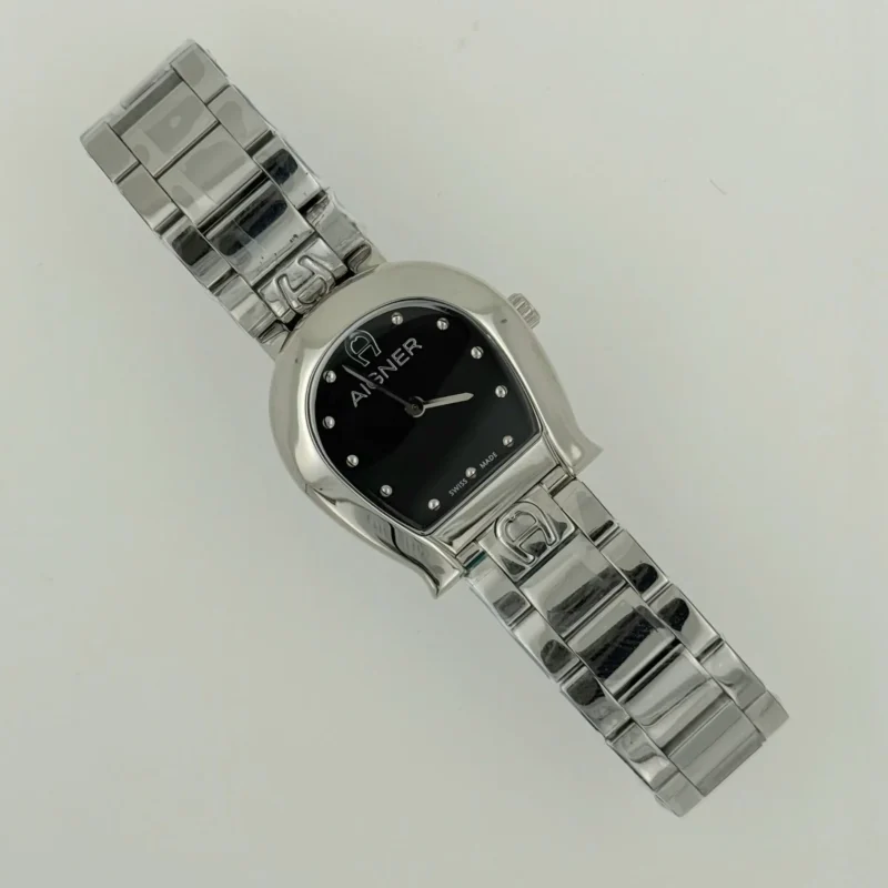 ساعة اقنر نسائي فضي مينا اسود