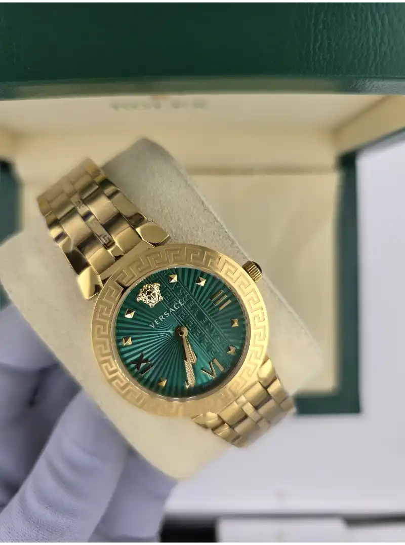 ساعة نسائي ذهبي مينا اخضر