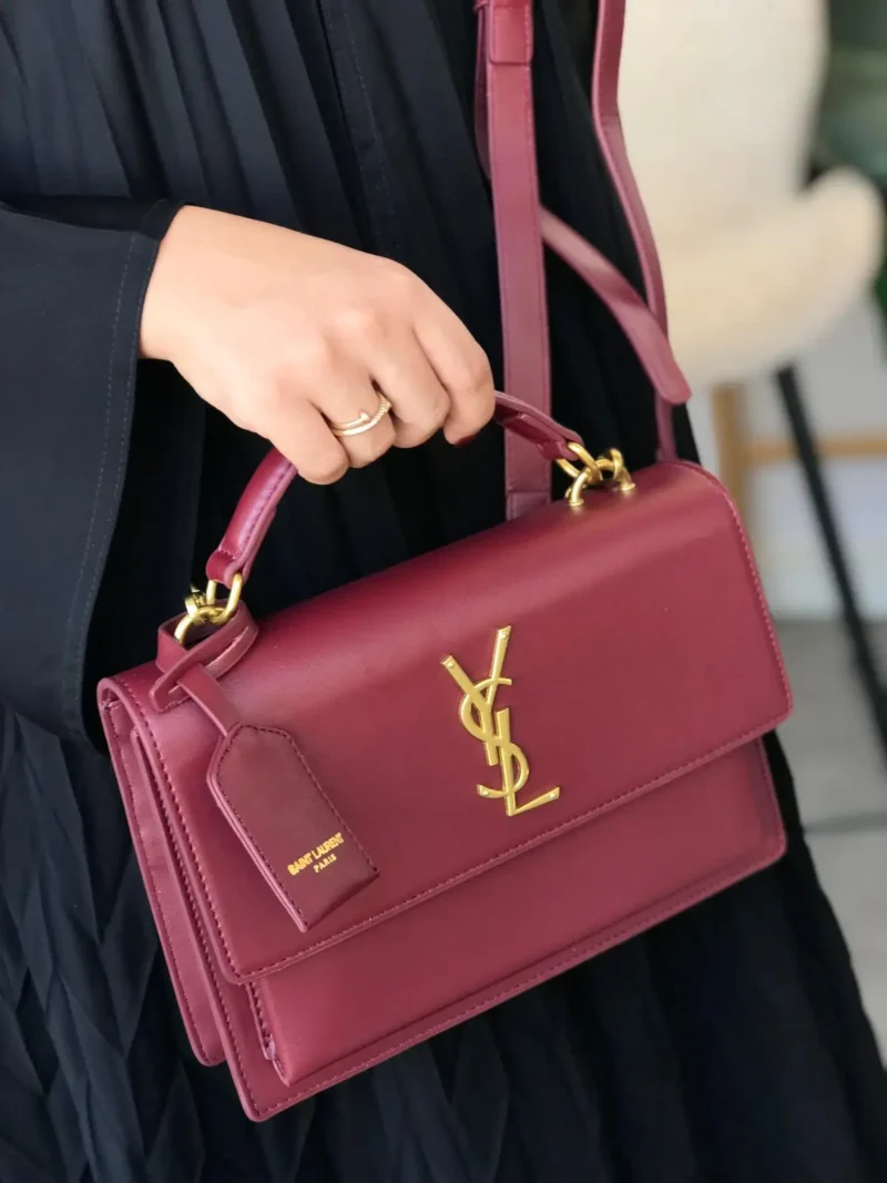 شنطة سان لوران احمر