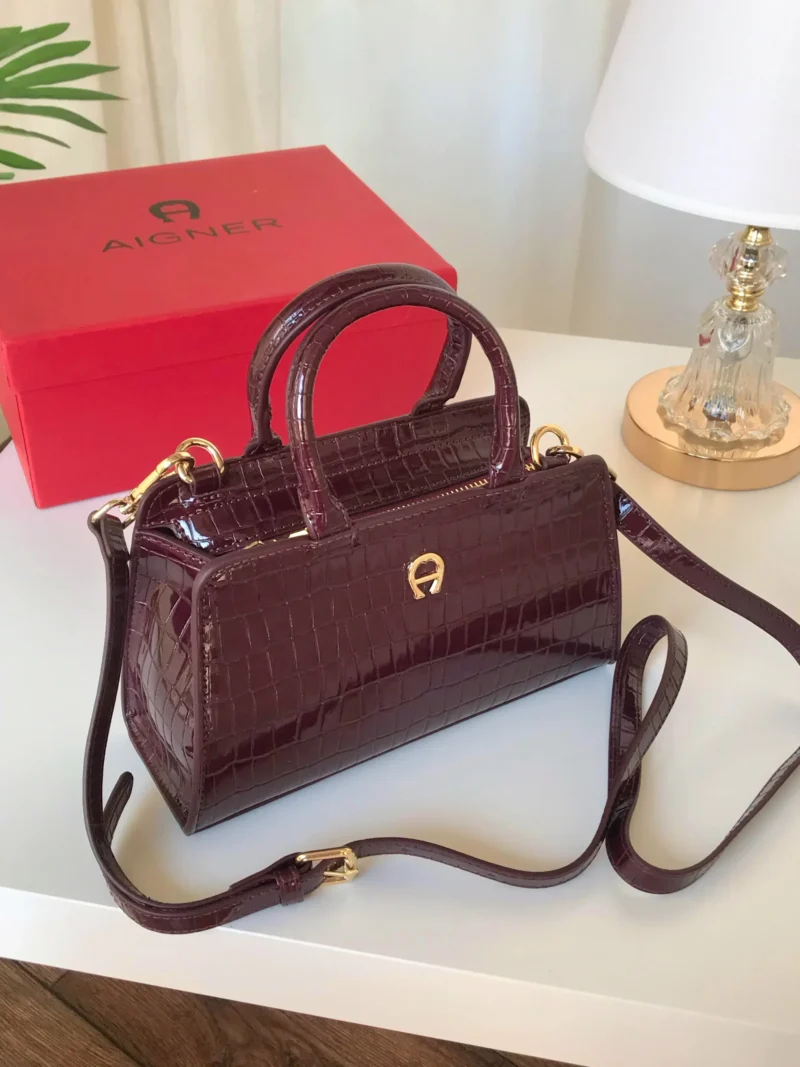 شنطة اقنر برغندي