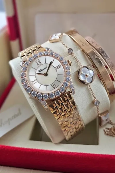 طقم ساعة وسوار نسائي