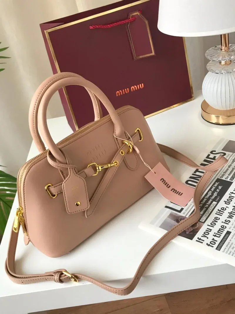 شنطة ميوميو وردي