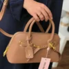 شنطة يد ميو ميو