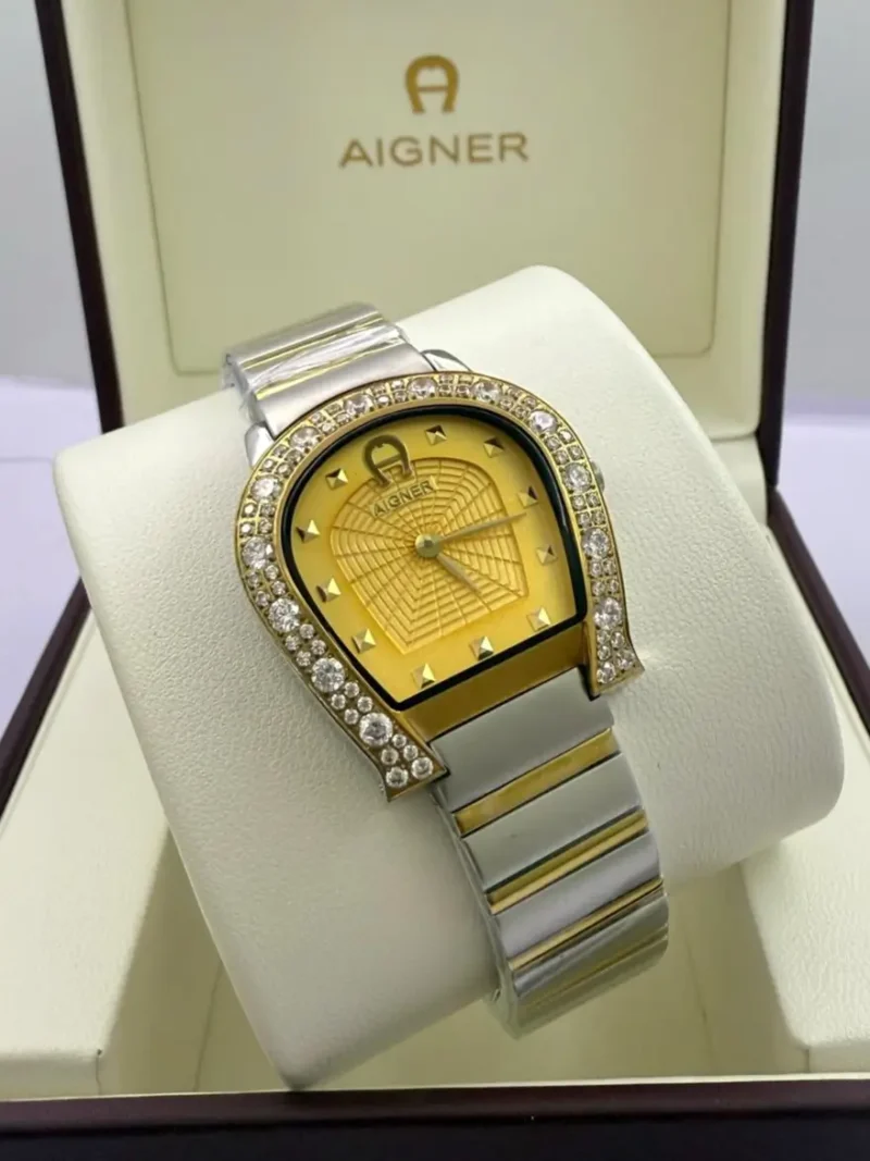 ساعة اقنر نسائية فضي وذهبي الماس