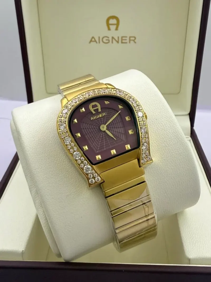 ساعة اقنر الماس ذهبية