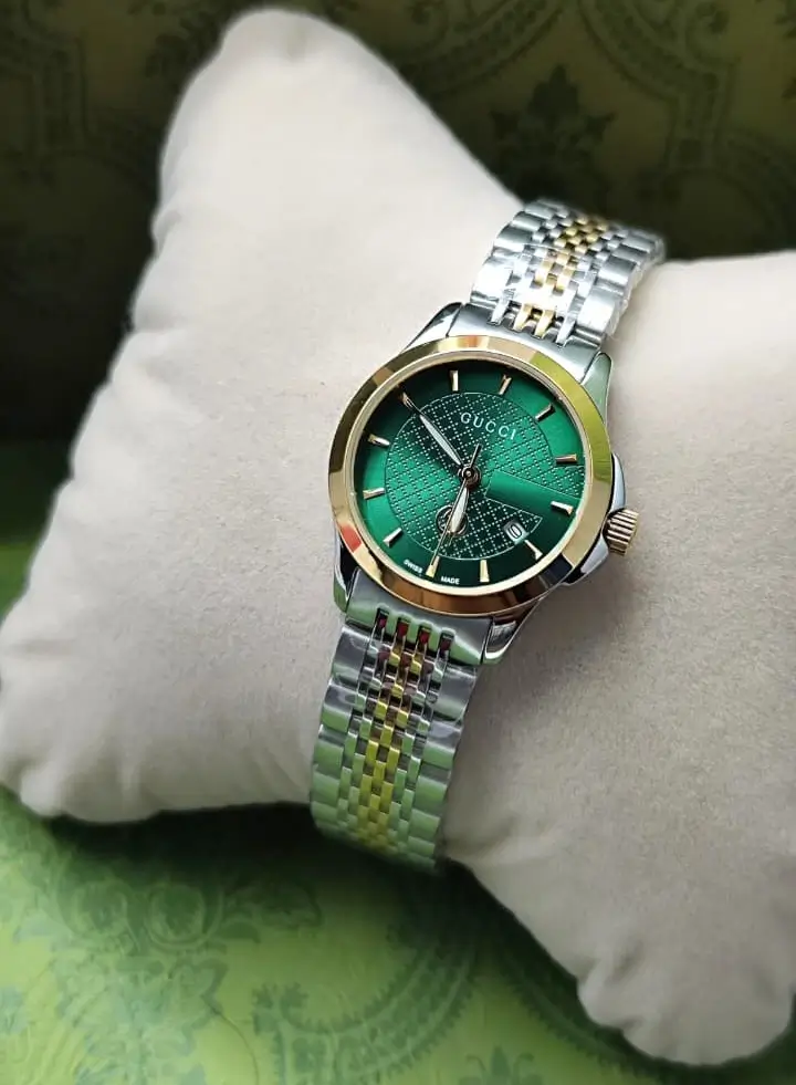 ساعه قوتشي مينا أخضر نسائي