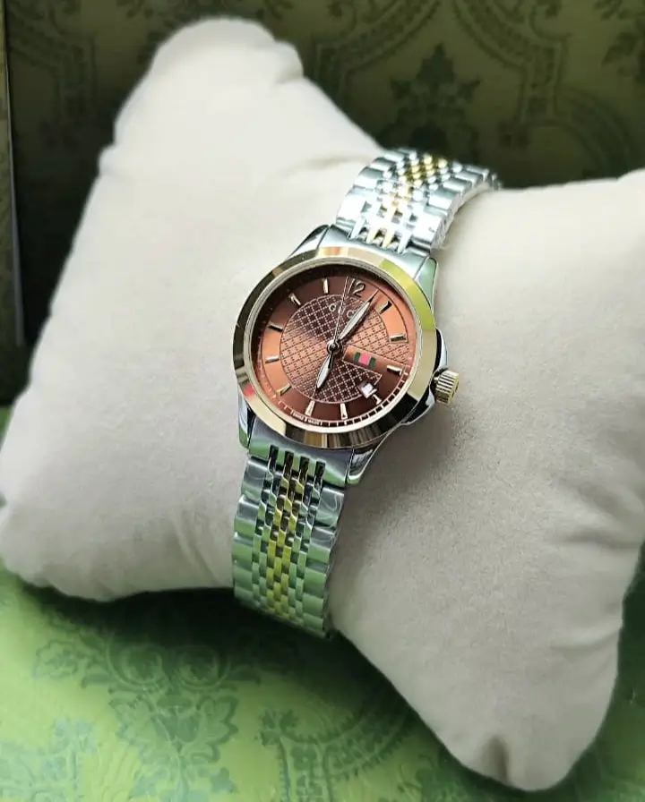 ساعه قوتشي نسائي عسلي