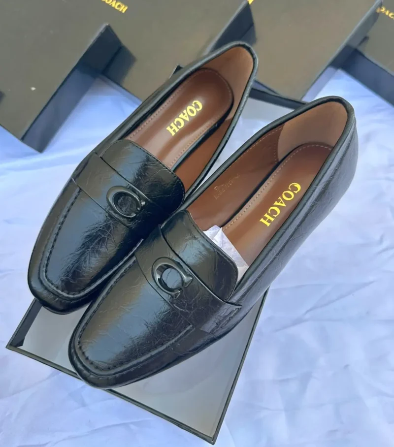 لوفر كوتش اسود