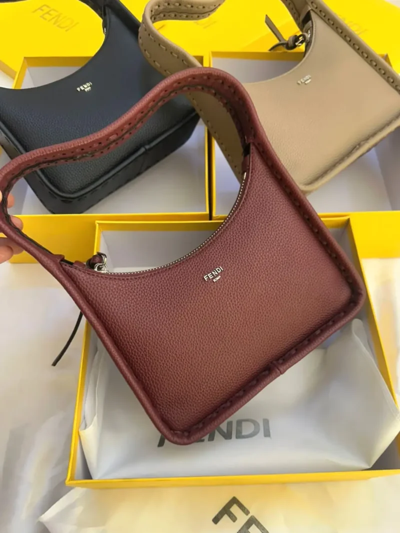 شنطه فندي عنابيه