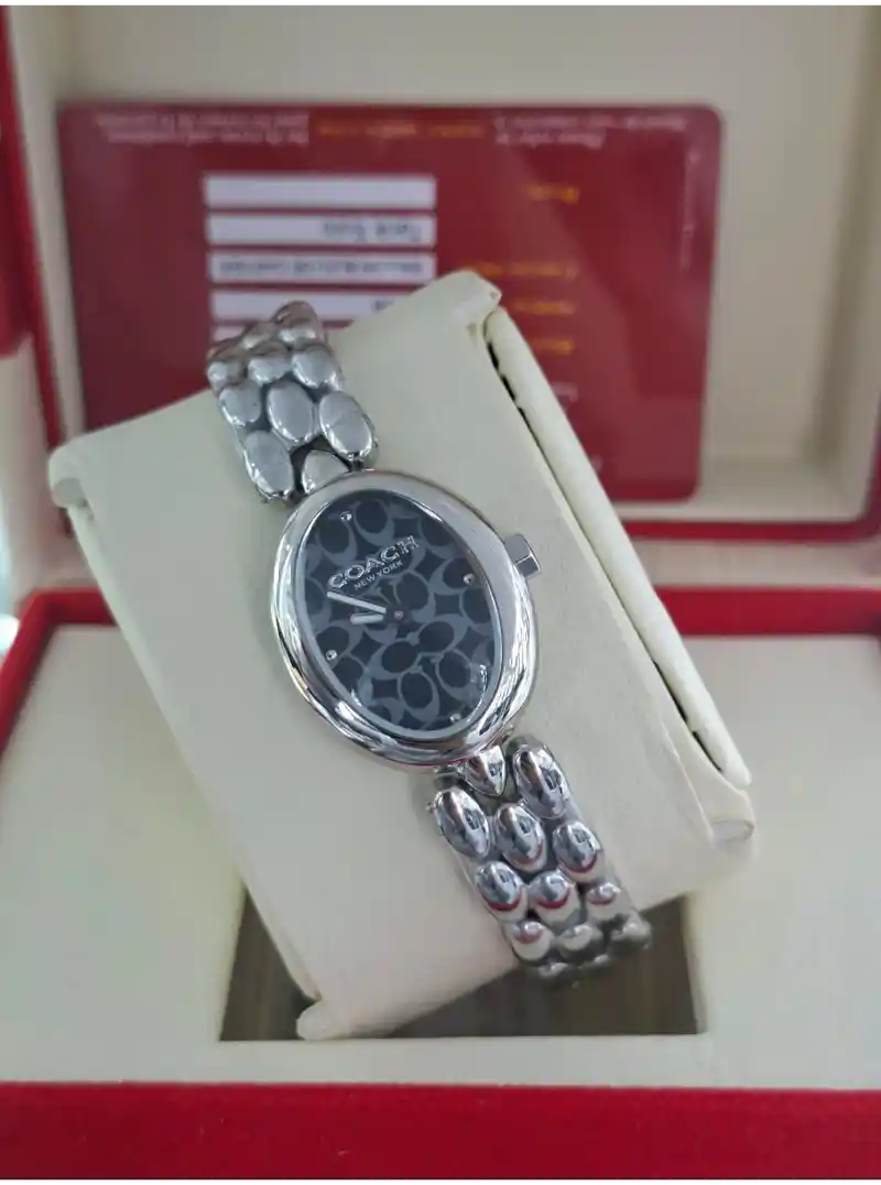 ساعة كوتش فضي نسائي