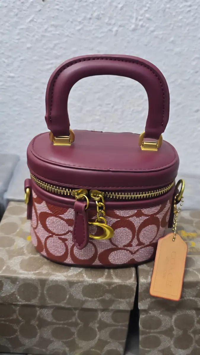 شنطه كوتش عنابي ميني