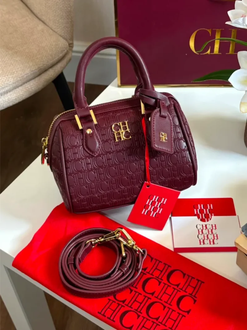شنطه سي اتش عنابيه